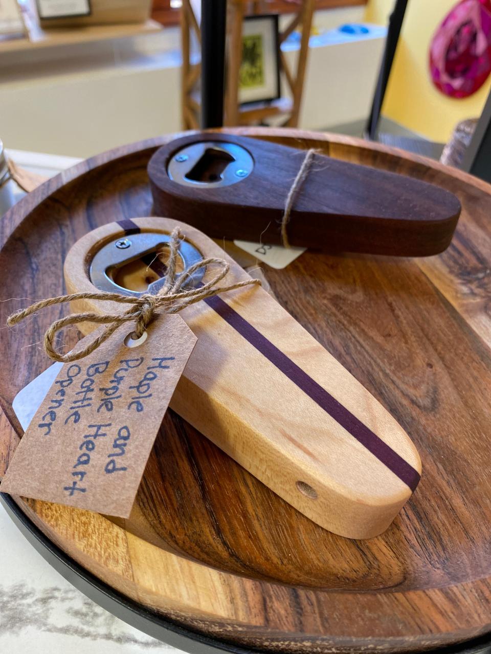 Wooden bottle openers from Notched Designs in Warren.