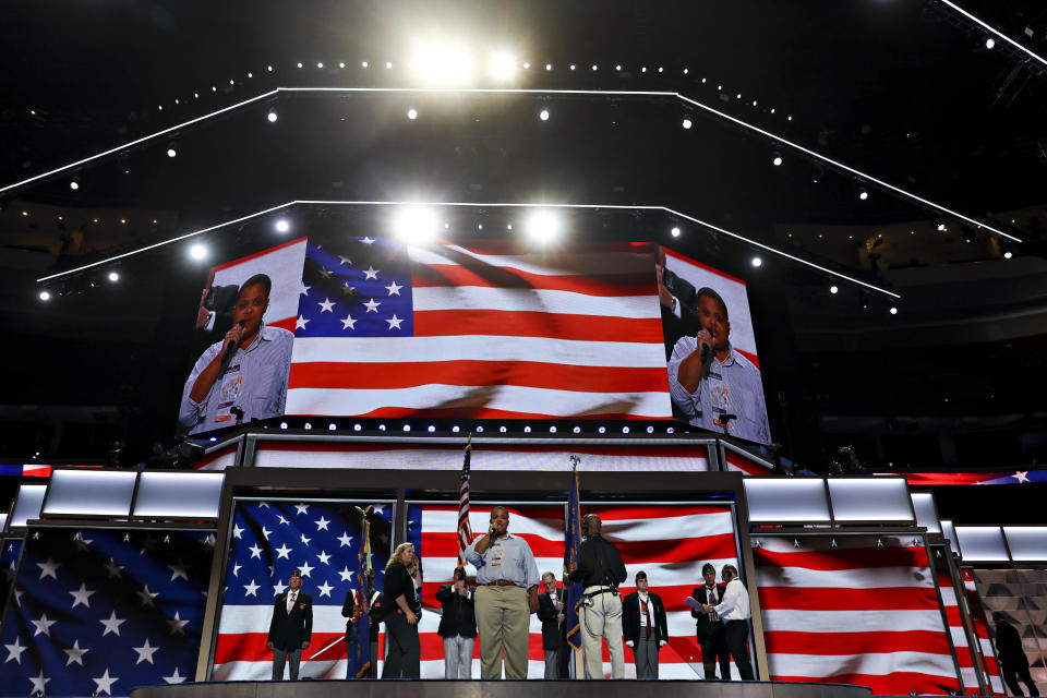 Singer Robert Hill rehearses the National Anthem.