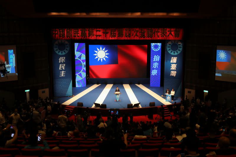 Members from the Kuomintang, Taiwan's main opposition, arrive to attend its annual conference in Taipei