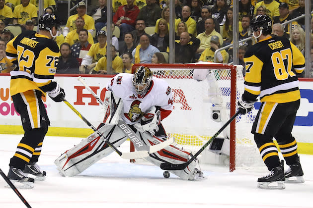 PITTSBURGH, PA – MAY 13: Craig Anderson #41 of the Ottawa Senators makes a save against Sidney Crosby #87 and Patric Hornqvist #72 of the Pittsburgh Penguins during the first period in Game One of the Eastern Conference Final during the 2017 NHL Stanley Cup Playoffs at PPG PAINTS Arena on May 13, 2017 in Pittsburgh, Pennsylvania. (Photo by Bruce Bennett/Getty Images)