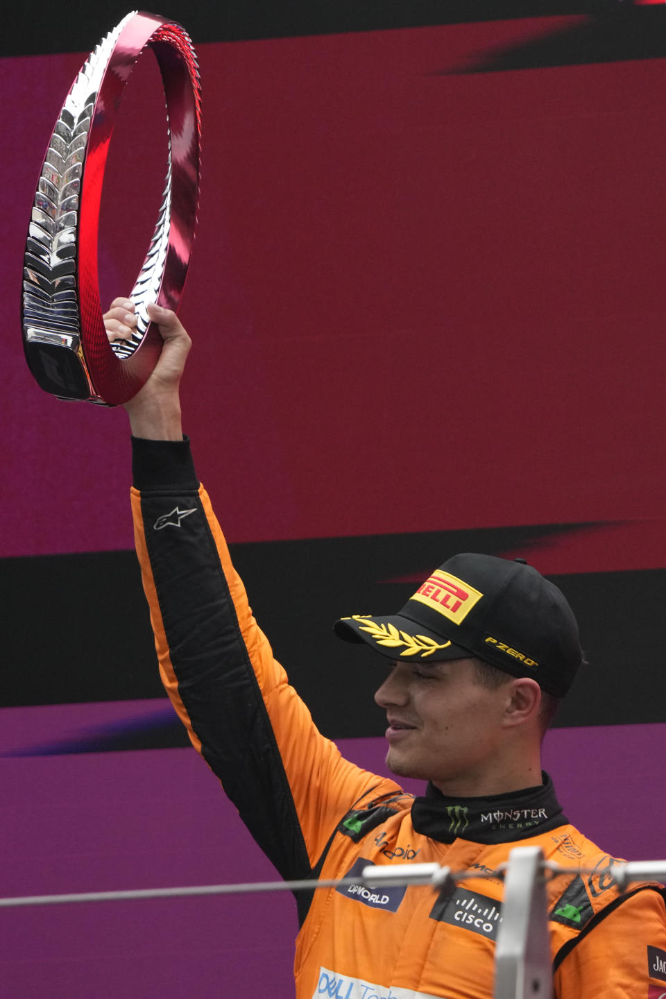 Second placed McLaren driver Lando Norris of Britain celebrates on the podium after the Chinese Formula One Grand Prix at the Shanghai International Circuit, Shanghai, China, Sunday, April 21, 2024. (AP Photo/Andy Wong)