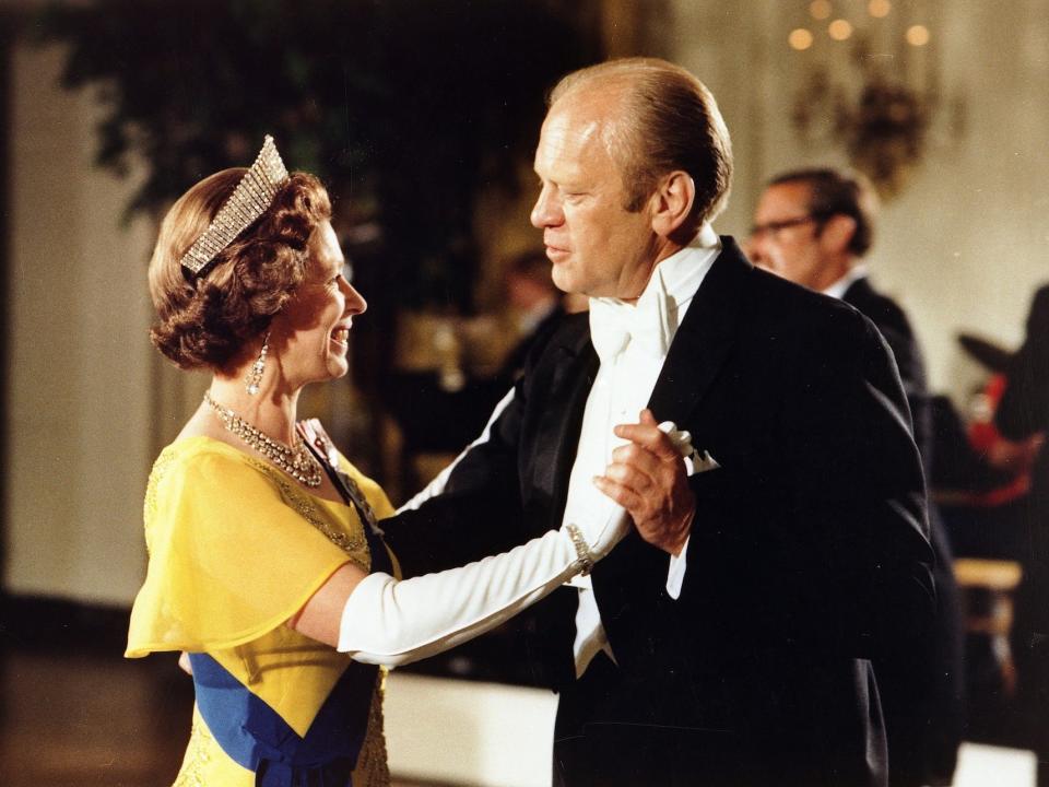 Queen Elizabeth dances with President Gerald Ford