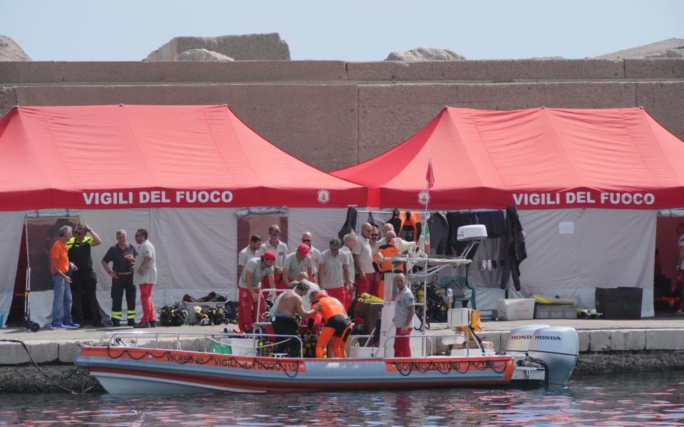 Dive teams return to harbour from site of Bayesian on fourth day of search