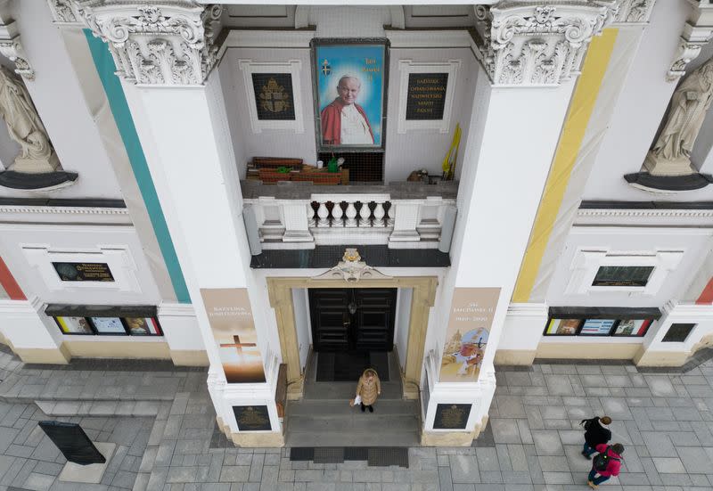 Image of Pope John Paul II is seen on the Basilica of the Presentation of the Blessed Virgin Mary in Wadowice