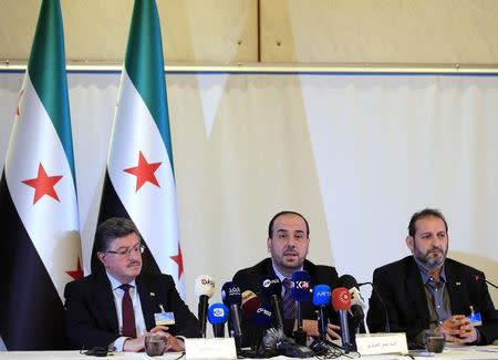 (L-R) Salim al-Muslat, Nasr al-Hariri and Fateh Hassoun members of the Syrian High Negotiations Committee (HNC) opposition group addresse the media aside of the Intra-Syria peace talks in Geneva, Switzerland, February 25, 2017. REUTERS/Pierre Albouy