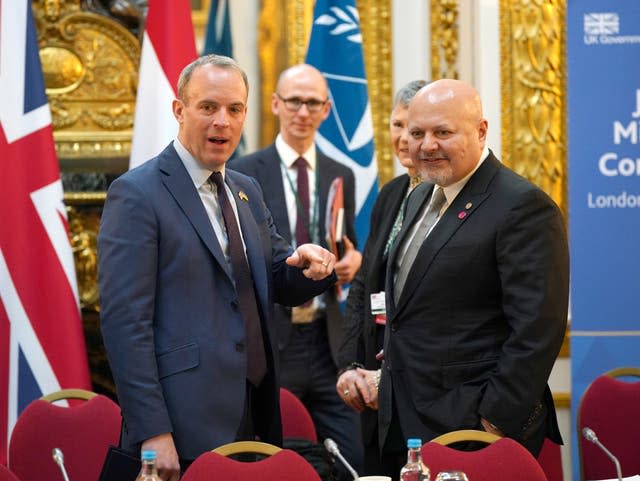 Dominic Raab greets Karim Khan