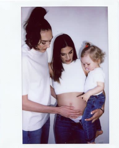 <p>Breanna Stewart Instagram</p> Breanna, Marta, and Ruby in pregnancy announcement