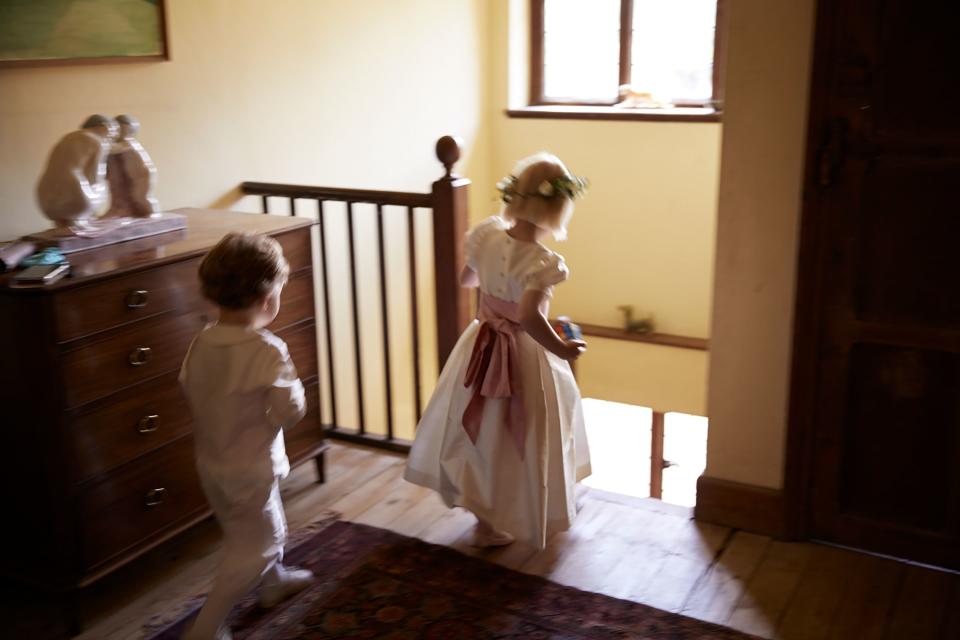 My nephew George and cousin Lara preparing to leave. They wore dresses and knickerbockers of ivory shot silk.