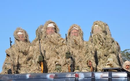 Iraqi federal police members are seen during an Iraqi military parade in Baghdad's fortified Green Zone, Iraq December 10, 2017. REUTERS/Stringer