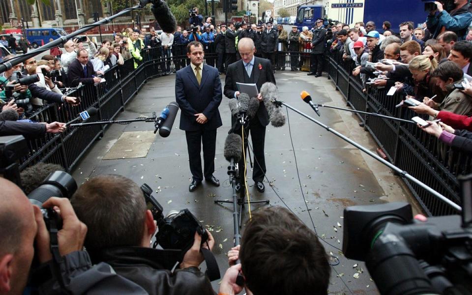 Royal butler Paul Burrell has a statement read by his solicitor, Andrew Shaw, outside the Old Bailey in London, after the case against him was dropped and he was formally found not guilty of three charge of stealing from the estate of Diana, Princess of Wales, the Prince of Wales and Prince William (PA)