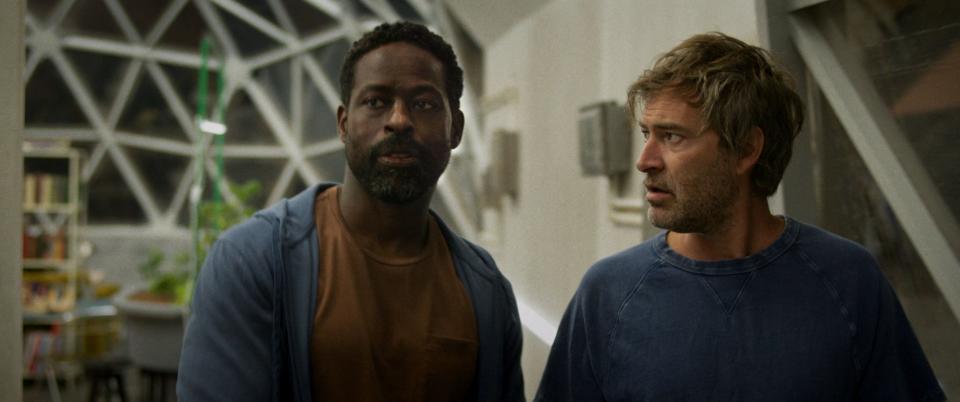 Sterling K. Brown, left, and Mark Duplass star in "Biosphere," a post-apocalypse comedy of sorts co-written and directed by Mel Eslyn, a Menomonee Falls native.