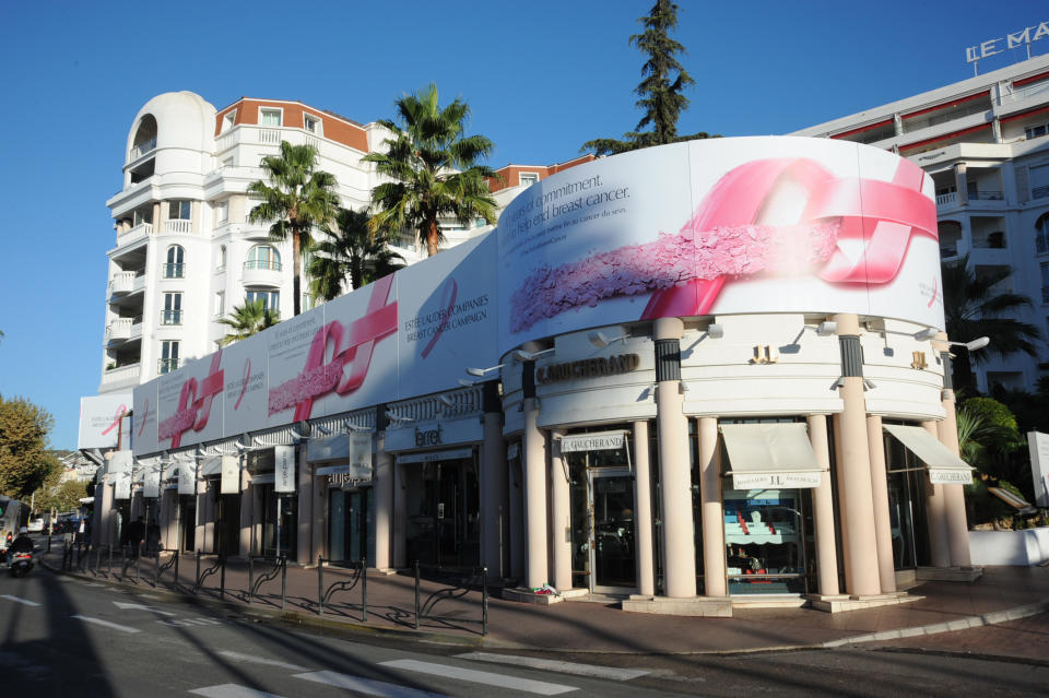 The Estée Lauder Cos.’ pink ribbon-adorned posters.