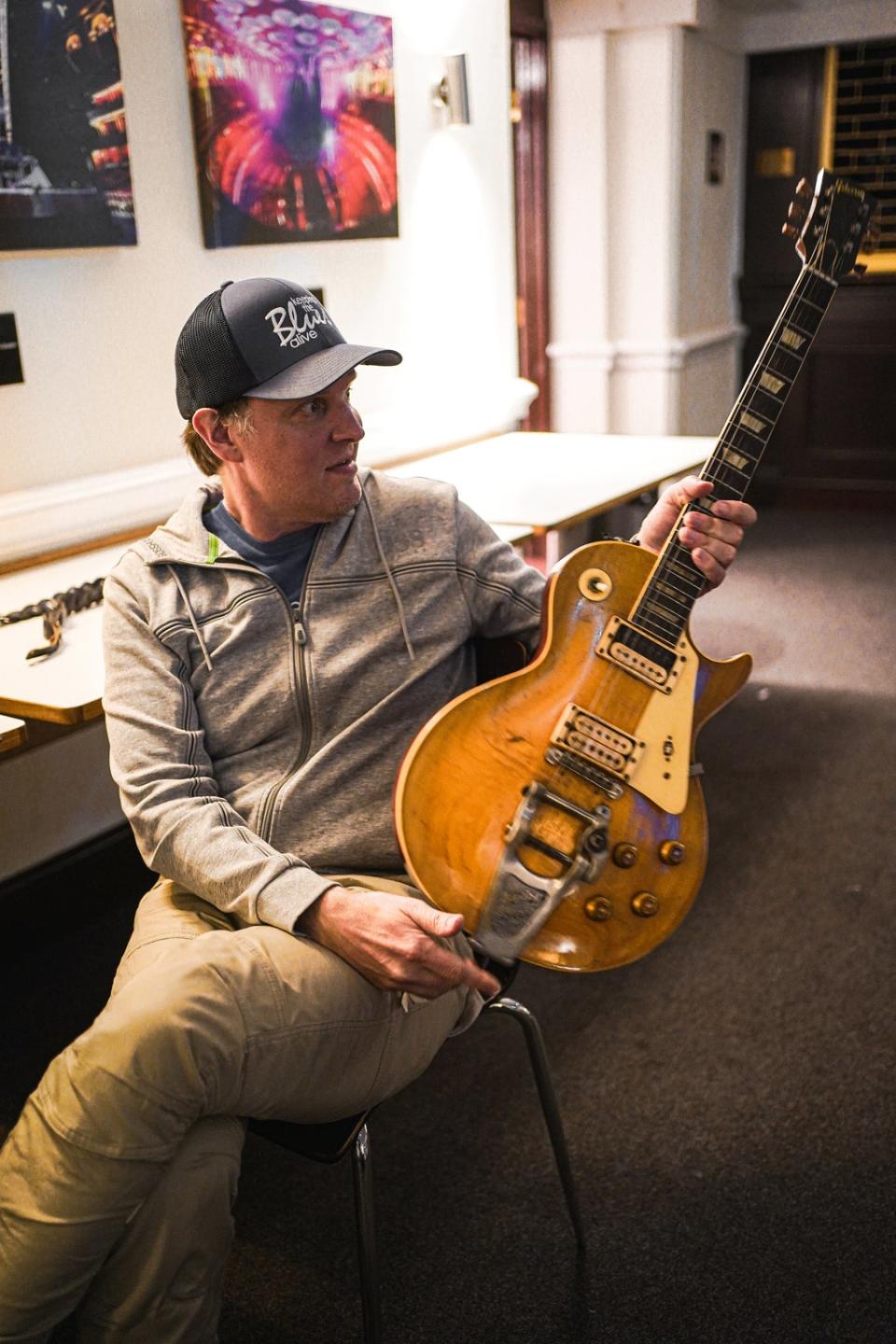 American artist Joe Bonamassa with his newly purchased Gibson Les Paul (ATB Guitars / SWNS)