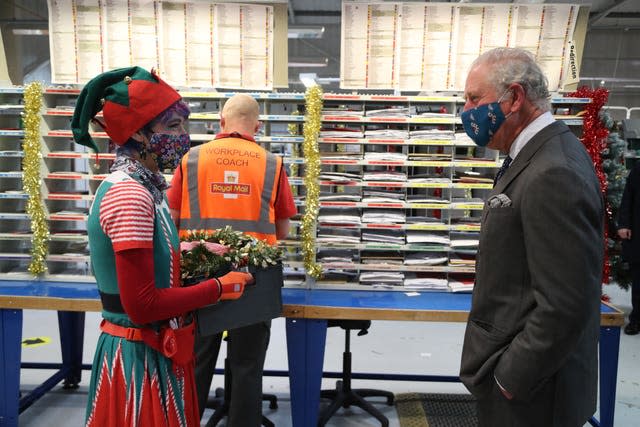 The Prince of Wales meets Royal Mail employee Catherine Griffiths. Geoff Caddick/PA Wire