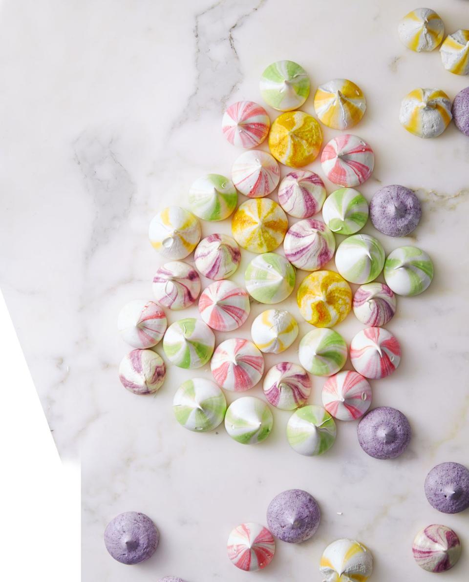 <p>You'll never believe how simple these rainbow meringues are to make. Choose from almond, lemon, mint and blueberry, or get creative with your own add-ins.</p><p>Get the <a href="https://www.goodhousekeeping.com/food-recipes/dessert/a35756/merry-meringues/" rel="nofollow noopener" target="_blank" data-ylk="slk:Merry Meringues recipe;elm:context_link;itc:0;sec:content-canvas" class="link "><strong>Merry Meringues recipe</strong></a>.</p>