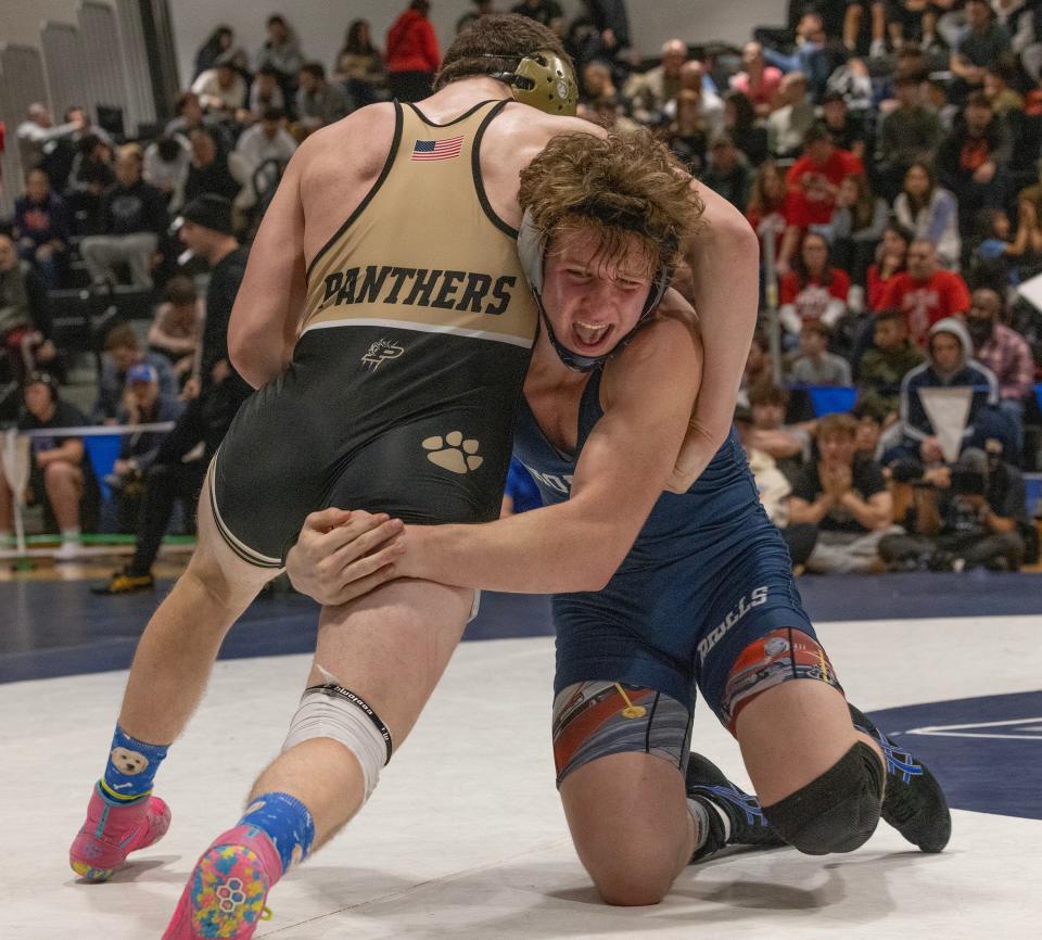 Howell's Tanner Hodgins (right) is shown during his 12-6 win over Point Pleasant Borough's Ryan Acquisto in the Shore Conference Tournament 175 pound final.