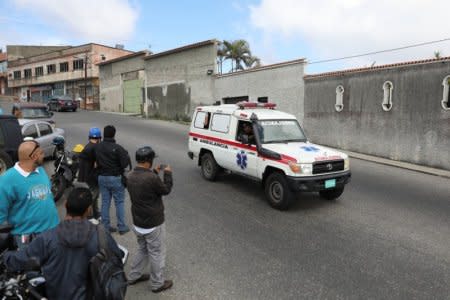 FILE PHOTO: An ambulance is seen during a shootout between security forces and rogue Venezuelan helicopter pilot Oscar Perez, in Caracas, Venezuela January 15, 2018. REUTERS/Marco Bello