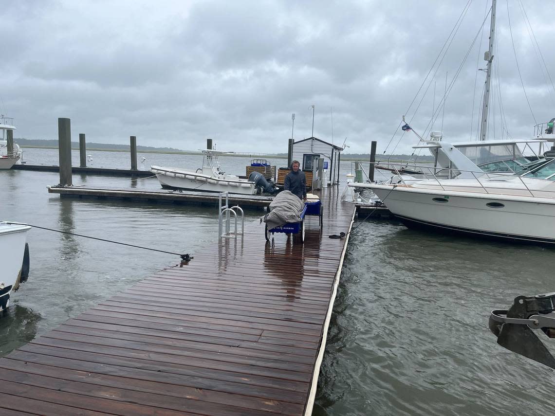 Earl Luttner was rushing his belongings from the boat Perfect Sense to shore at 10:30 a.m. Friday, Sept. 30, 2022, at the Beaufort Marina in advance of Ian, which was expected to make landfall in South Carolina as a low-level hurricane later in the day.