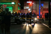 Police are seen near the scene of a mass shooting in Toronto, Canada, July 22, 2018. REUTERS/Chris Helgren