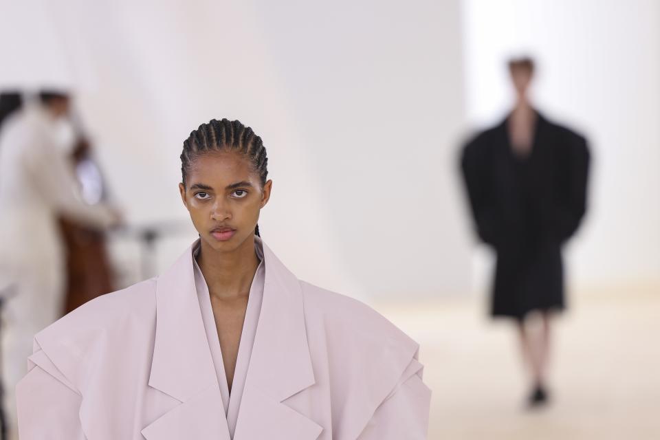 A model wears a creation for the Issey Miyake Spring/Summer 2024 womenswear fashion collection presented Friday, Sept. 29, 2023 in Paris. (AP Photo/Vianney Le Caer)