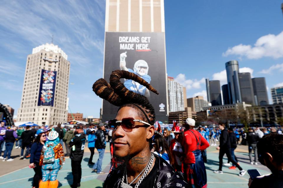 Hip-hop artist MPR Richie Rich, 35, of Atlanta, could be mistaken for am L.A. Rams fan the way his hair is styled but he said it's just the look he's going for in front of the NFL draft theater and before the start of the 2024 NFL draft in Detroit on Thursday, April 25, 2024. Rich, who said he has been growing his hair for this look for the past eight years, is originally from Detroit and is a Detroit Lions fan.