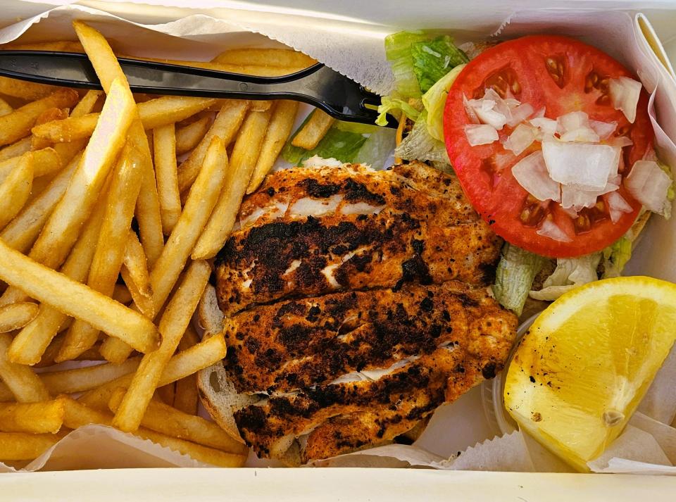 Blackened grouper sandwich with fries at Star Fish Company, in the historic commercial fishing village of Cortez on north Sarasota Bay, photographed Nov. 11, 2023