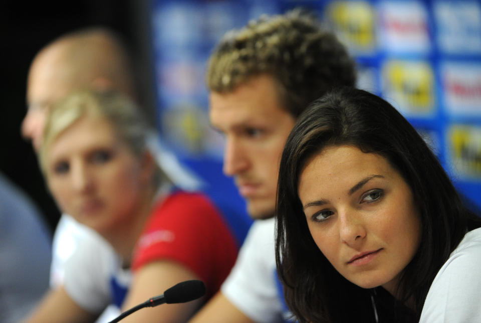 (L-R) Britain's swimmers Rebecca Adlington, Adam Brown and Keri-Anne Payne give a press conference at the indoor stadium of the Oriental Sports Center during the FINA World Championships in Shanghai, on July 21, 2011. The FINA world championships' swimming events start on July 24, 2011. AFP PHOTO / MARK RALSTON (Photo credit should read MARK RALSTON/AFP/Getty Images)