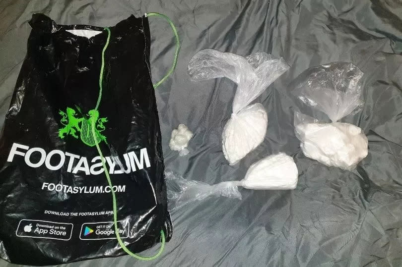 Drugs discovered inside a Footasylum bag in a flat on Belem Close