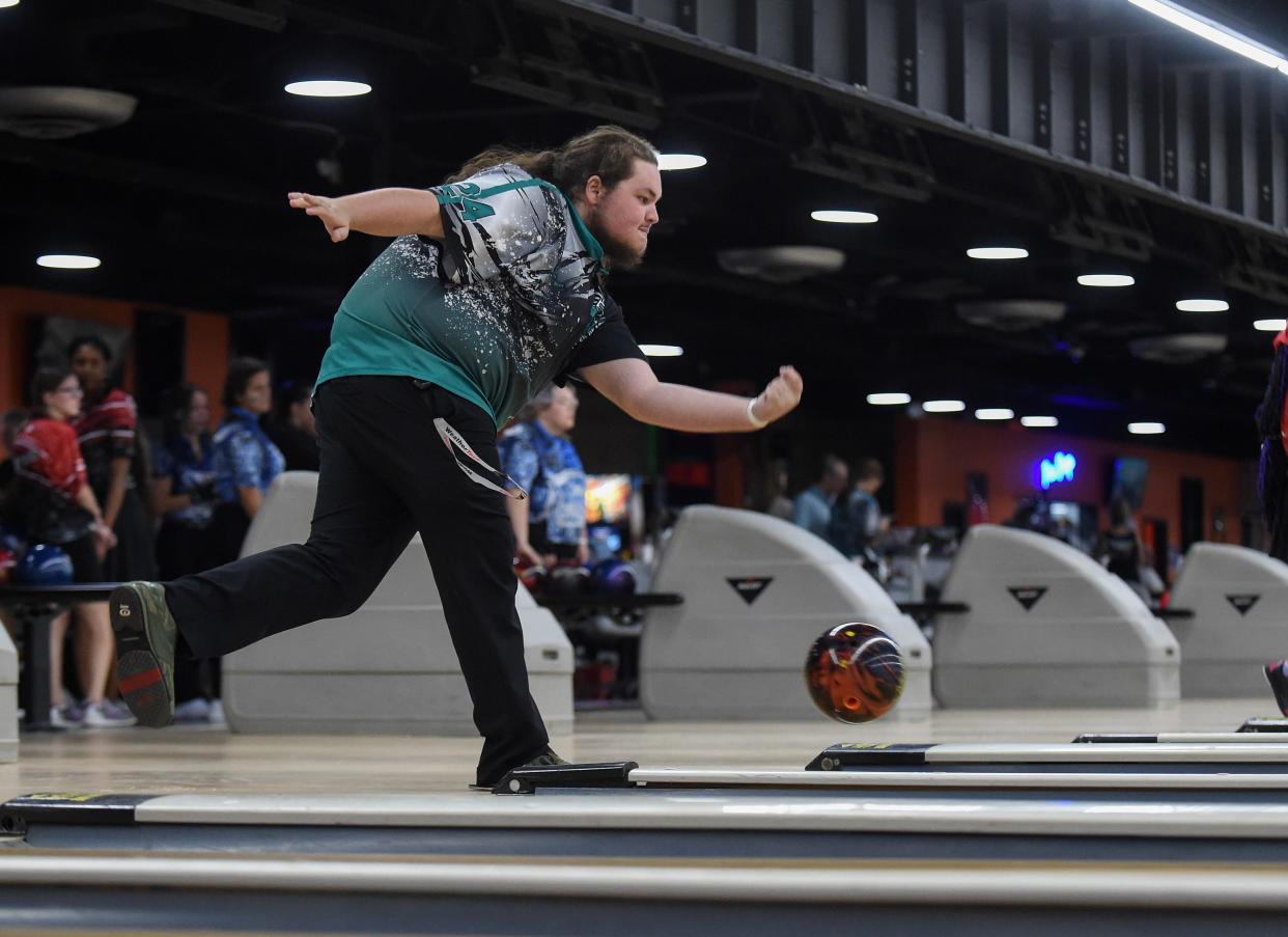 Jensen Beach High School's Chase McNamara fires down the lane while competing in the their FHSAA District 12 bowling tournament at St. Lucie Lanes on Tuesday, Oct. 24, 2023, in Port St. Lucie. McNamara's scores helped the boys team to win the district tournament and also the boys top scorer in the district final. "I've been bowling for four years for this team and we've gotten real close multiple times, and as my last year this is probably the best thing I could have ever done," McNamara said.