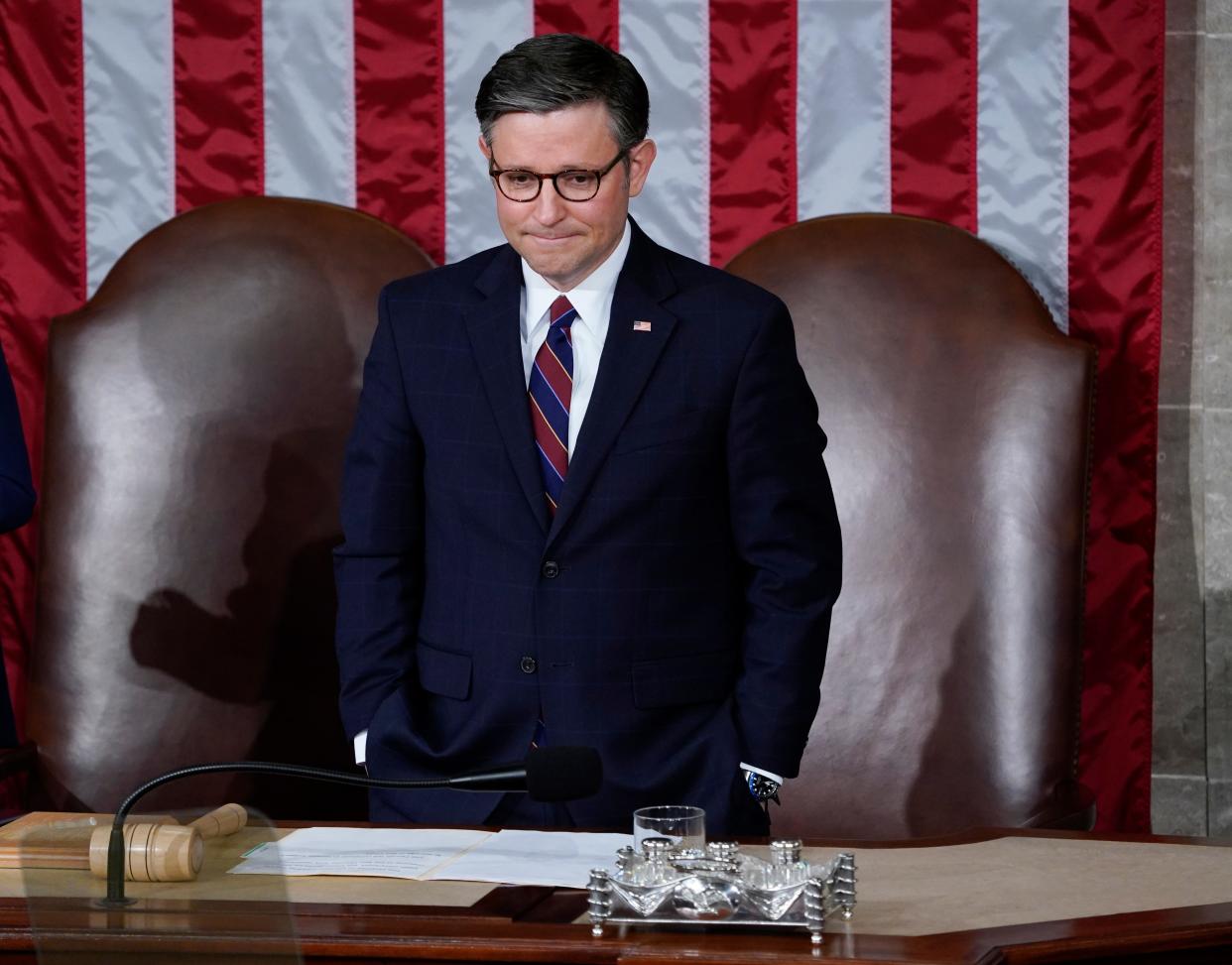 Speaker of the House Mike Johnson waits following Japanese Prime Minister Fumio Kishida addressing Congress in Washington. Johnson met with former President Donald Trump in Palm Beach Friday amid pressure on his leadership from conservatives. Trump said "I stand with the speaker."