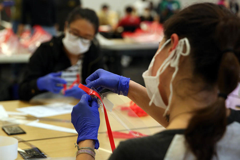 April 19: UCLA students and other volunteers make face shields for doctors who lacked enough personal protective equipment in Los Angeles, California. (Getty Images)