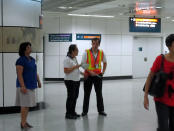 SBS Transit staff from various departments were activated to assist commuters at all affected North East Line train stations. (Yahoo! photo/Jeanette Tan)