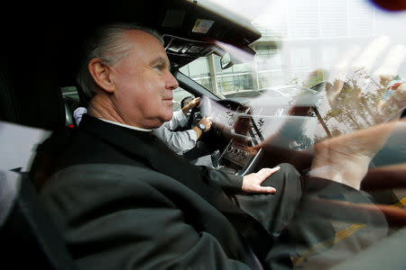 Irish-born Chilean priest John O'Reilly of the Legionaries of Christ conservative Roman Catholic order leaves from a court in Santiago, October 15, 2014. Picture taken October 15, 2014. REUTERS/Ivan Alvarado