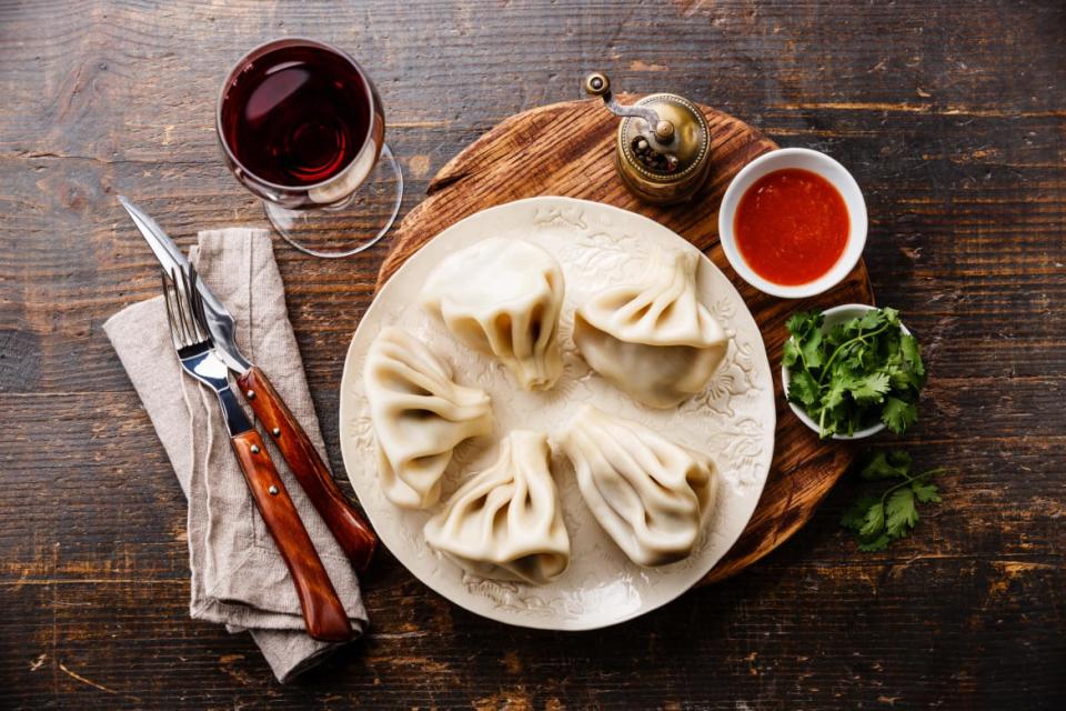 <div class="inline-image__caption"><p>Georgian dumplings Khinkali with meat, tomato spicy sauce and wine</p></div> <div class="inline-image__credit">Getty</div>