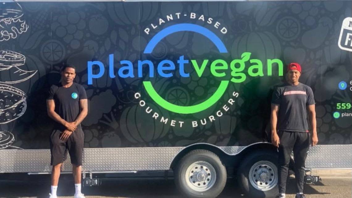 Planet Vegan co-owners Joe Ellis, left and Mike McElroy, right. Ellis was burned in a food truck explosion in central Fresno last week.