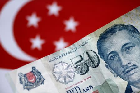 A Singapore dollar note is seen in this illustration photo May 31, 2017. REUTERS/Thomas White/Illustration/Files