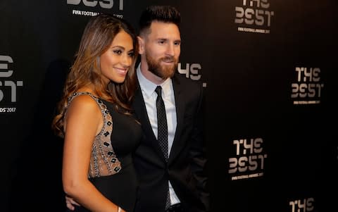 Leo Messi and wife Antonella - Credit: AP