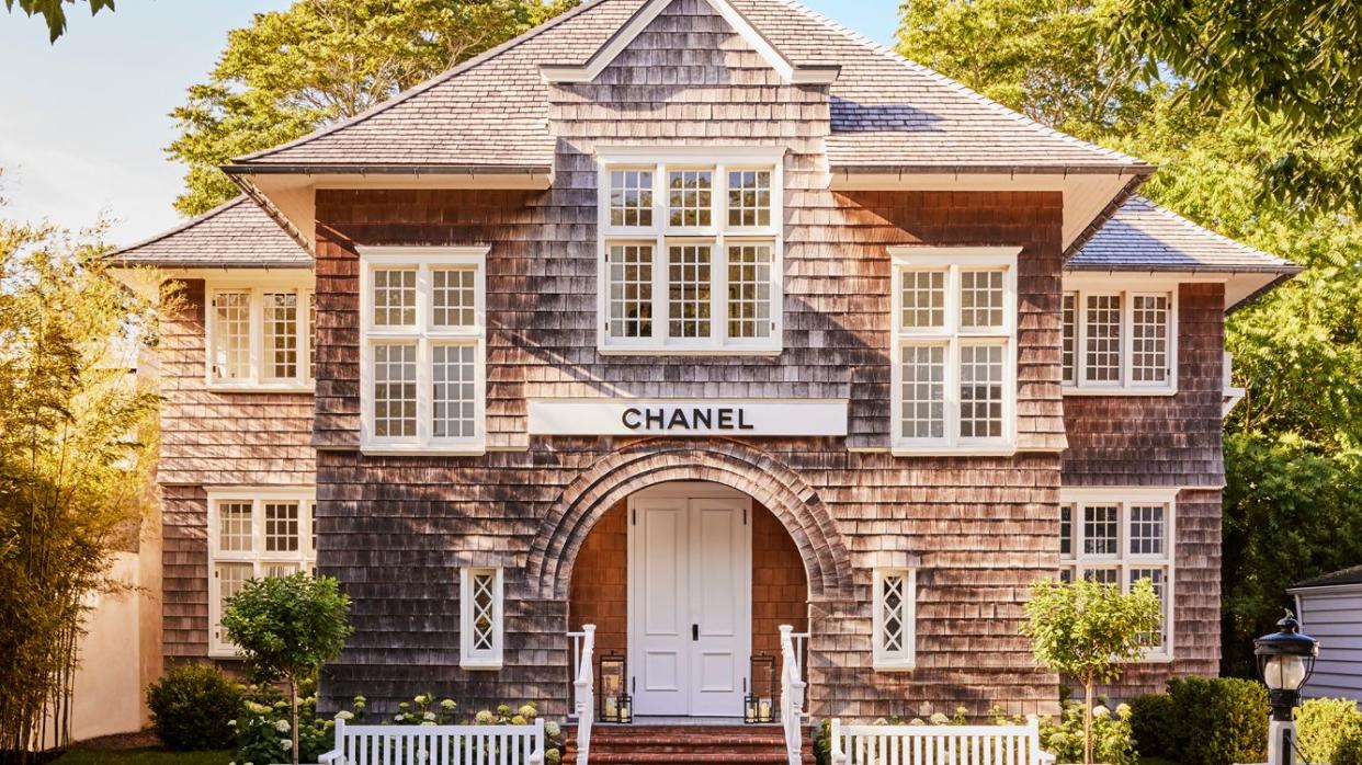 a brick building with a brick walkway