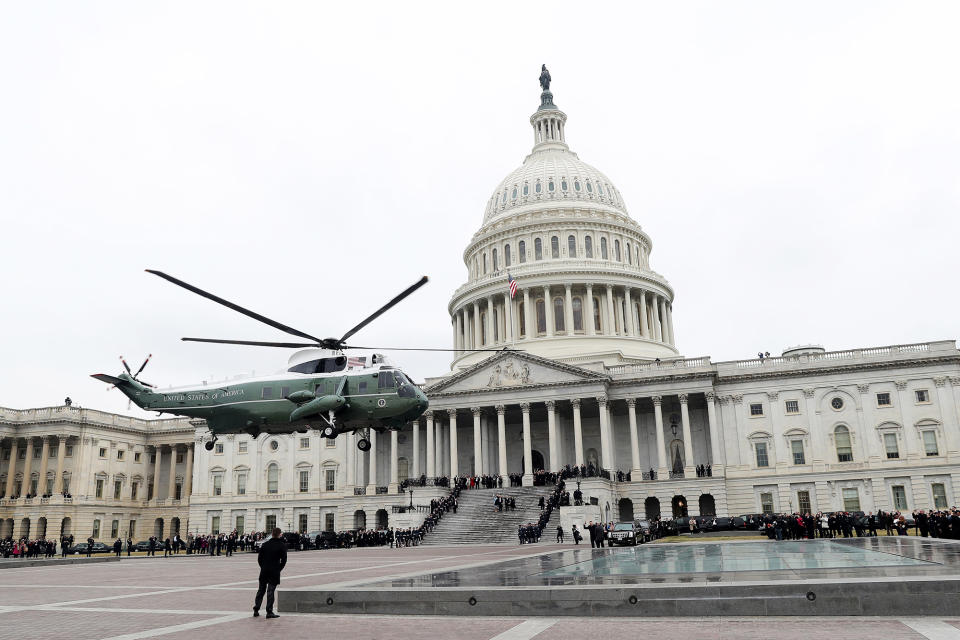 <p>A military helicopter carries former president Barack Obama and Michelle Obama from the U.S. Capitol in Washington on Jan. 20, 2017. (Photo: Rob Carr/Pool/Reuters) </p>