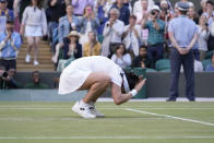 Tunisia's Ons Jabeur celebrates defeating Belgium's Elise Mertens during a fourth round women's singles match on day seven of the Wimbledon tennis championships in London, Sunday, July 3, 2022. (AP Photo/Alberto Pezzali)