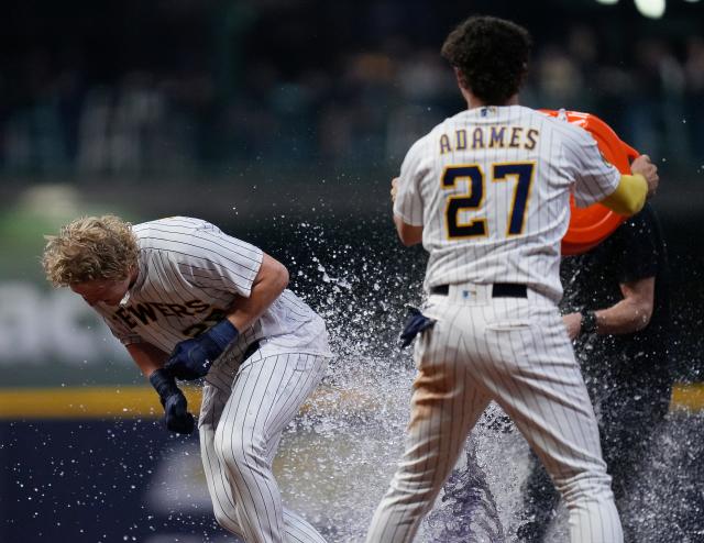 Houser homers, strikes out 10 to make Brewers history in win over