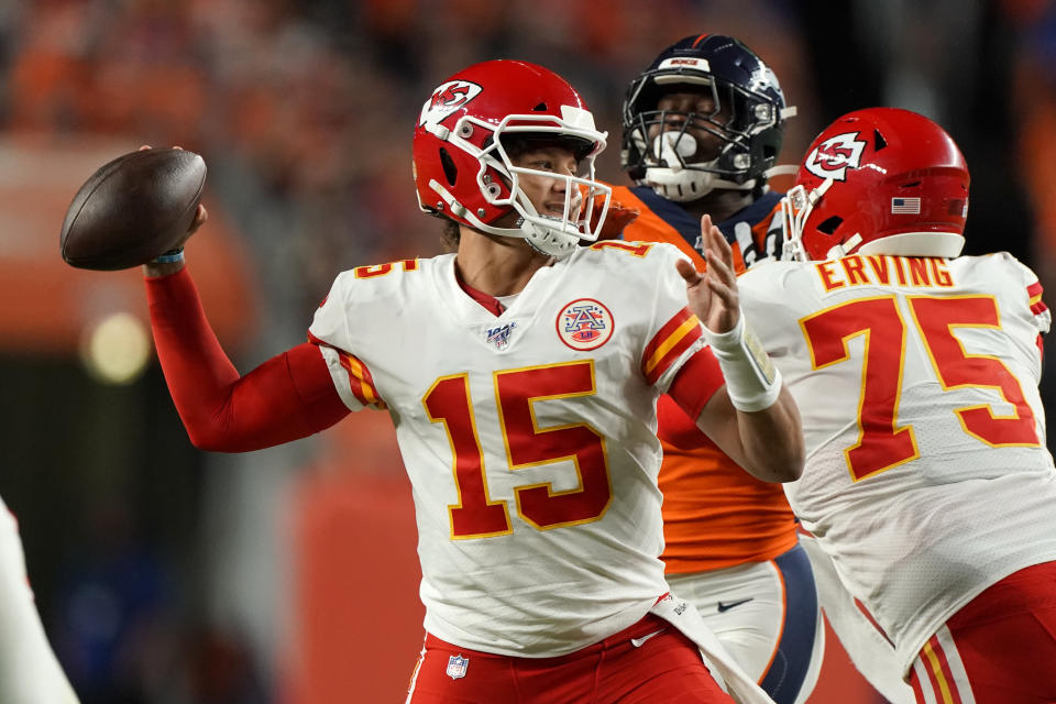 Kansas City Chiefs quarterback Patrick Mahomes (15) throws against the Denver Broncos during the first half of an NFL football game, Thursday, Oct. 17, 2019, in Denver. (AP Photo/Jack Dempsey)