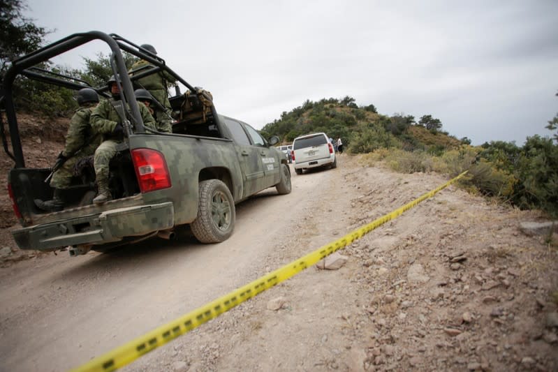 Soldiers assigned to the National Guard, escort a caravan of vehicles with relatives of the Rhonita Miller-Lebaron and Dawna Ray Langford, on their journey to bury the Miller-Lebaron Family near Bavispe