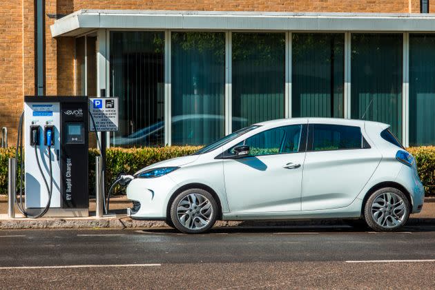 Electric car plugged into a charge point in Cambridge, England. (Photo: Education Images via Getty Images)
