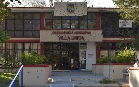 Villa Union city hall riddled with bullet holes - Credit: Gerardo Sanchez/AP