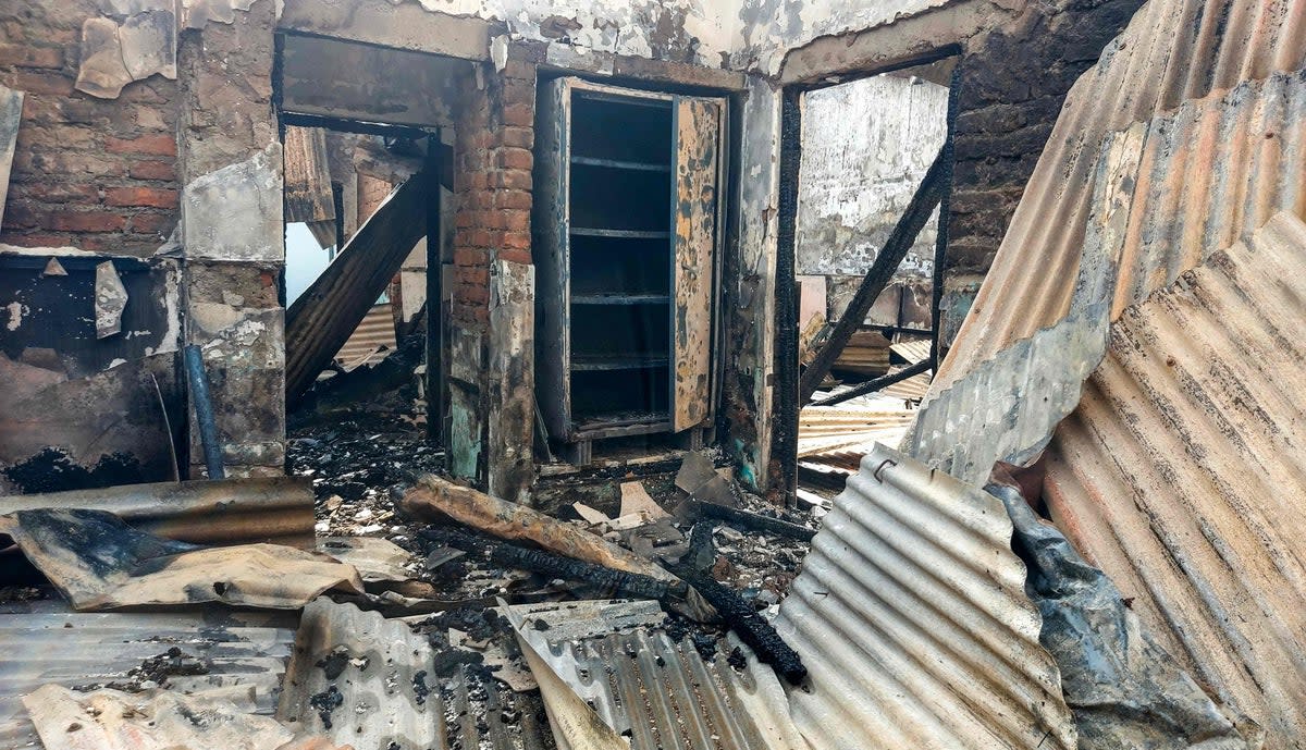 Charred remains of official residence of Manipur’s minister Nemcha Kipgen in Imphal, which was set ablaze by mob last evening during ongoing ethnic violence in India’s north-eastern Manipur state (AFP via Getty Images)