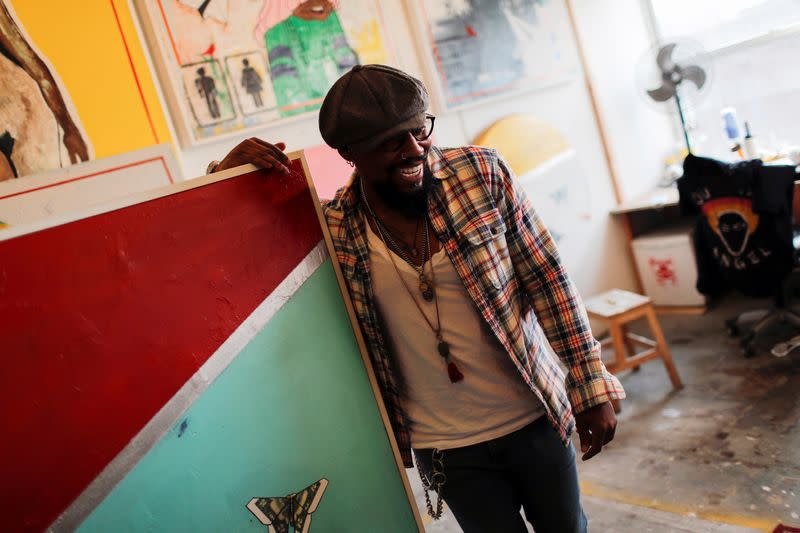 Artist Guy Stanley Philoche is pictured in his studio in the Harlem section of New York
