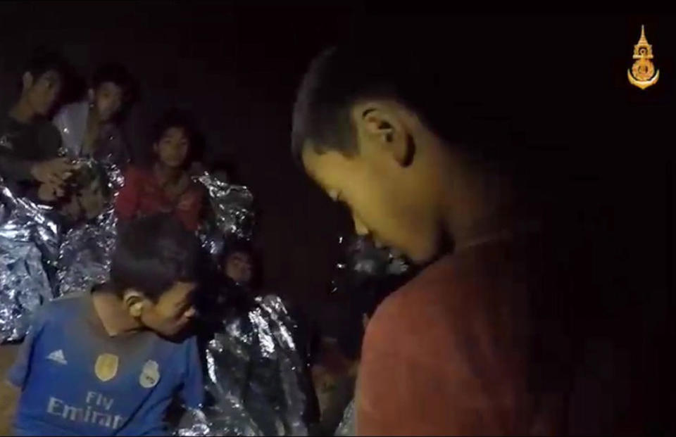 Members of a trapped soccer team in a section of Tham Luang cave in Khun Nam Nang Non Forest Park, Chiang Rai province. Source: AAP