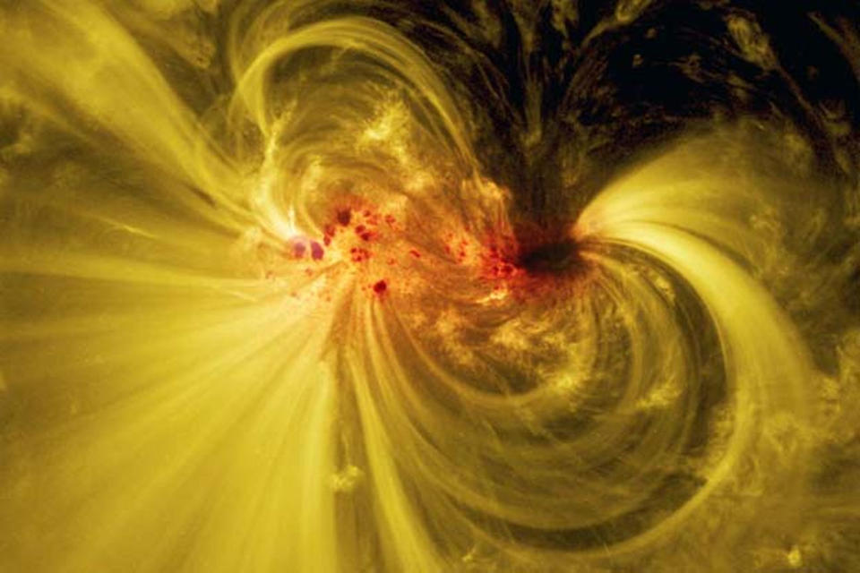 This composite view of sunspot AR12665 is composed of visible and extreme ultraviolet light imagery captured by NASA's Solar Dynamics Observatory. <cite>NASA’s Goddard Space Flight Center/SDO</cite>
