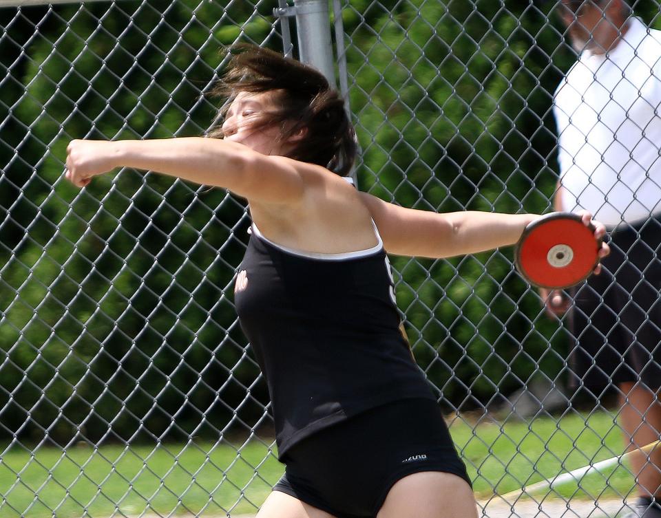 Marlington's Lauren Keithley during a discus throw at the Division II district track and field finals at Salem Sebo Stadium on Saturday, May 21, 2022.